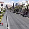 A couple walks southbound on the Las Vegas Strip near Flamingo Road Friday, March 20, 2020.