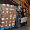 A pallet of food items is moved at Three Square Food Bank.