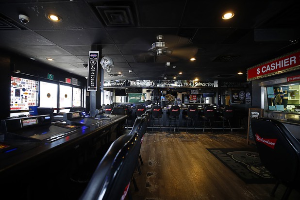 A view of the casino and bar area, currently closed, in the Stage Door Casino at Flamingo Road and Linq Lane Tuesday, March 31, 2020. The adjoining convenience and liquor store is still open.