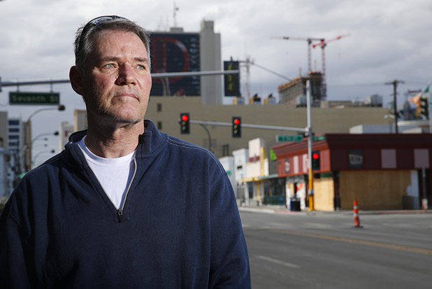 Robert Dornisch, a table games dealer at the Golden Nugget, poses outside of his apartment complex in downtown Las Vegas Tuesday, April 7, 2020.