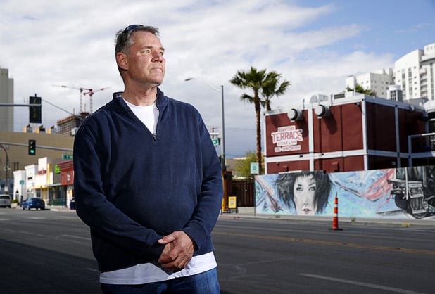 Robert Dornisch, a table games dealer at the Golden Nugget, poses outside of his apartment complex in downtown Las Vegas Tuesday, April 7, 2020.