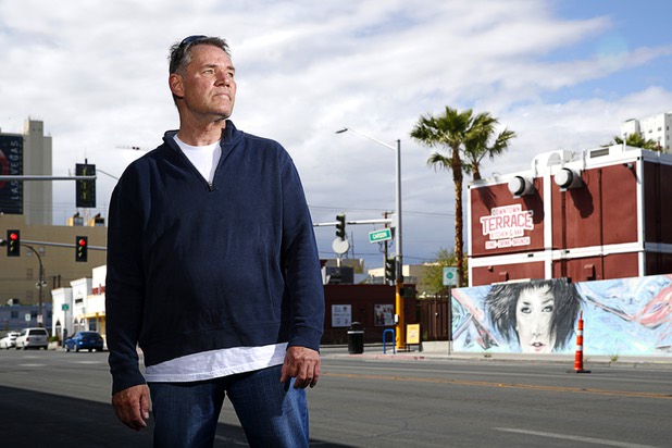 Robert Dornisch, a table games dealer at the Golden Nugget, poses outside of his apartment complex in downtown Las Vegas Tuesday, April 7, 2020.