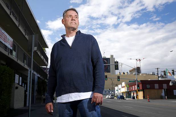 Robert Dornisch, a table games dealer at the Golden Nugget, poses outside of his apartment complex in downtown Las Vegas Tuesday, April 7, 2020.