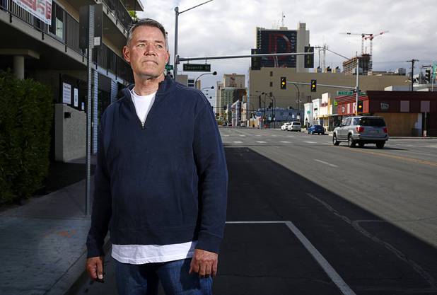 Robert Dornisch, a table games dealer at the Golden Nugget, poses outside of his apartment complex in downtown Las Vegas Tuesday, April 7, 2020.