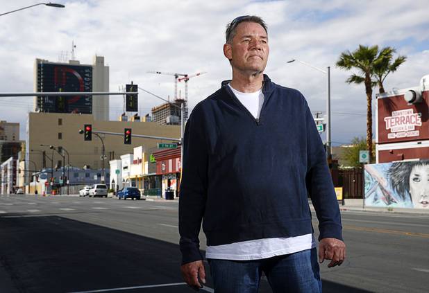 Robert Dornisch, a table games dealer at the Golden Nugget, poses outside of his apartment complex in downtown Las Vegas Tuesday, April 7, 2020.