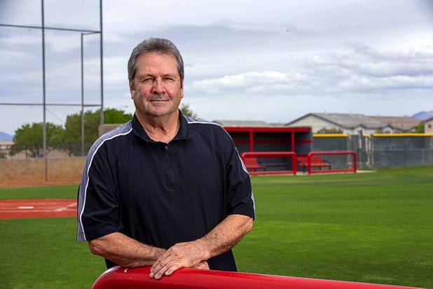 Baseball umpire Phil Schlosser poses at Bryce Harper Field at Las Vegas High School Friday, April 10, 2020. Schlosser is retired but supplements his pension with referee work. With no games happening, he's lost that extra income.