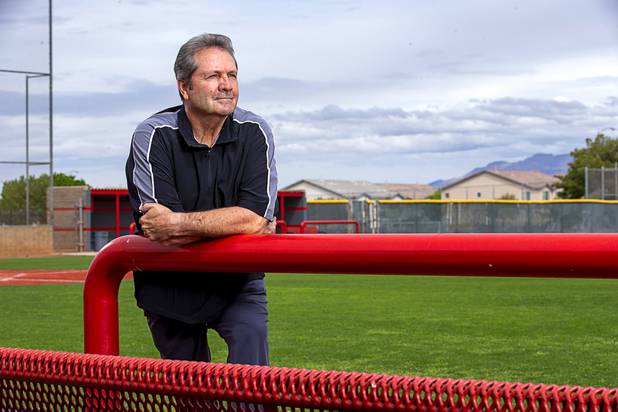 Baseball umpire Phil Schlosser poses at Bryce Harper Field at Las Vegas High School Friday, April 10, 2020. Schlosser is retired but supplements his pension with referee work. With no games happening, he's lost that extra income.