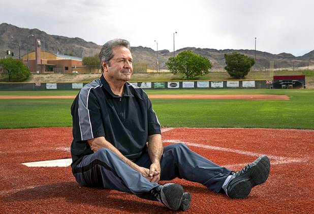 Baseball umpire Phil Schlosser poses at Bryce Harper Field at Las Vegas High School Friday, April 10, 2020. Schlosser is retired but supplements his pension with referee work. With no games happening, he's lost that extra income.