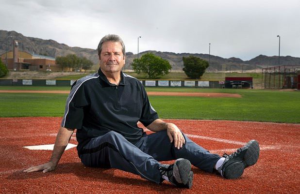 Baseball umpire Phil Schlosser poses at Bryce Harper Field at Las Vegas High School Friday, April 10, 2020. Schlosser is retired but supplements his pension with referee work. With no games happening, he's lost that extra income.