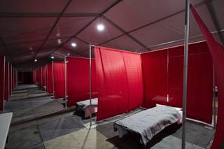 A view of the Red isolation tent, one of three tents used to quarantine homeless patients exposed to coronavirus, in the ISO-Q Complex for at Cashman Center, downtown, Monday, April 13, 2020. The Red isolation tent will hold homeless patients with confirmed coronavirus test results.