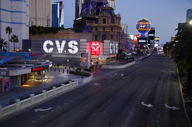The Las Vegas Strip is deserted as casinos and other business are closed because of the coronavirus outbreak, Tuesday, April 14, 2020, in Las Vegas.