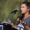 Immigrant rights activist Audrey Peral, shown at a rally for Las Vegas Dreamers in 2017, worries especially about the coronavirus victims and their families who have few resources or safety nets.