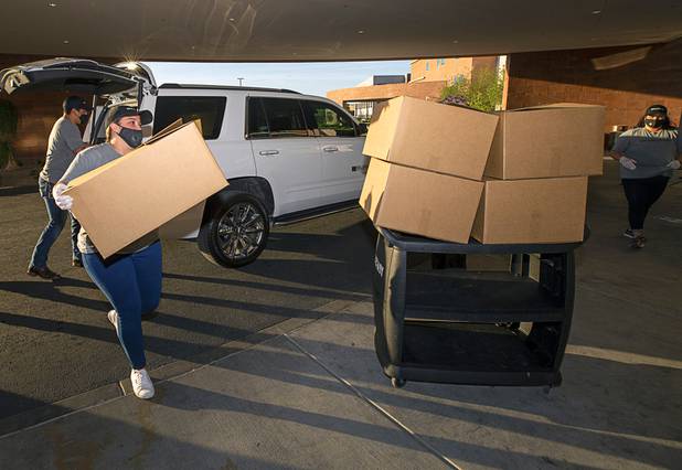 Workers representing Matter Real Estate and Burke Construction deliver 450 meals for healthcare workers, part of one of its final deliveries made through the "UnCommon Heroes" project, at Spring Valley Hospital Medical Center Friday, April 24, 2020. Matter and Burke are preparing to start work on Uncommons, a mixed-use development near I-215 and Durango Road in the southwest valley.