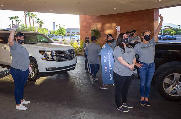 Workers representing Matter Real Estate and Burke Construction wave to hospital staff after delivering 450 meals for healthcare workers, part of one of its final deliveries made through the "UnCommon Heroes" project, at Spring Valley Hospital Medical Center Friday, April 24, 2020. Matter and Burke are preparing to start work on Uncommons, a mixed-use development near I-215 and Durango Road in the southwest valley.