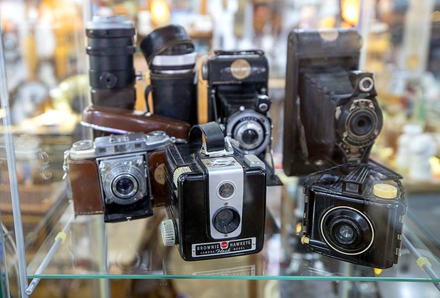 Vintage film cameras are displayed in Antique Alley Mall, 1131 S. Main Street, Saturday, May 9, 2020. Saturday was the first day restaurants, salons and other nonessential businesses were allowed to reopen after restrictions were imposed to help slow the spread of the new coronavirus.