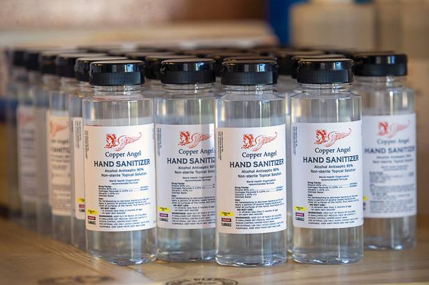 Bottles of hand sanitizer are displayed at the Las Vegas Distillery in Henderson Wednesday, May 13, 2020. The distillery has switched from making distilled spirits to hand sanitizer in order to help in the fight against the novel coronavirus (COVID-19).
