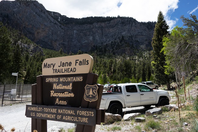 Cars fill the parking lot for the Mary Jane Falls ...