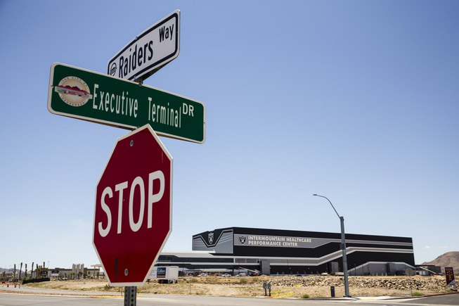 A newly installed Raiders Way street sign is posted in ...