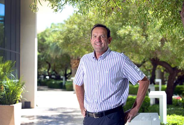 Mike Querrey, vice president of strategic retail growth for Guild Mortgage, poses outside Turnberry Towers Wednesday, May 20, 2020. 