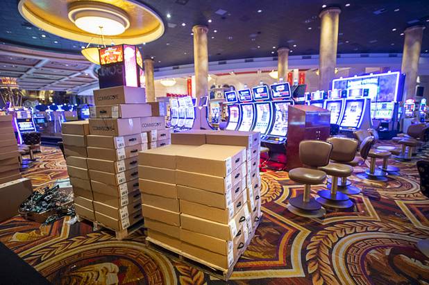 Boxes of cables, part of a previously-planned technology upgrade, are stacked on the casino floor during a tour of Caesars Palace Thursday, May 21, 2020.