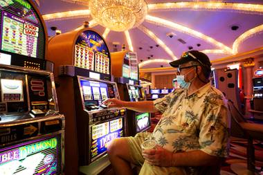 John Charles of Texas arrived in Las Vegas on an early morning flight in order to be among the first guests at Caesars Palace as the casino reopened its doors to the public during phase 2 of the COVID-19 pandemic Thursday, June 4, 2020.