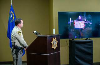 Metro Police Assistant Sheriff Chris Jones watches a video featuring Jorge Gomez during a briefing at police headquarters Friday, June 5, 2020. Gomez, 25, died after being shot by police during a George Floyd protest in downtown Las Vegas Monday, June 1, 2020.