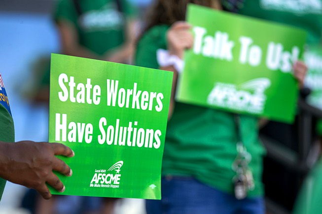 American Federation of State County Municipal Employees (AFSCME) union members ...