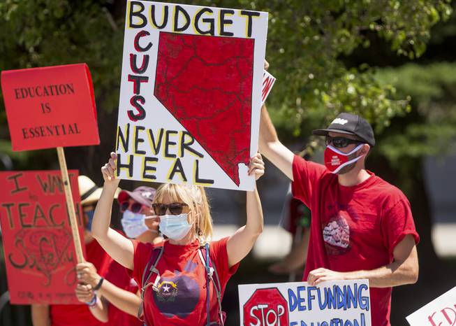 Protesters rally against budget cuts to education outside the Nevada Legislature on the first day of the 31st Special Session in Carson City on Wednesday, July 8, 2020. 