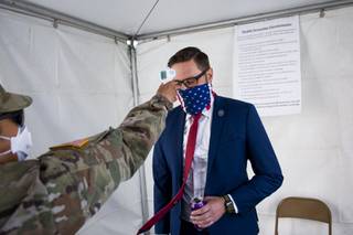 Nevada Assemblyman, Gregory Hafen II gets his temperature checked before the first day of the 31st Special Session of the Nevada Legislature in Carson City, Nev., on Wednesday, July 8, 2020. (David Calvert/The Nevada Independent)