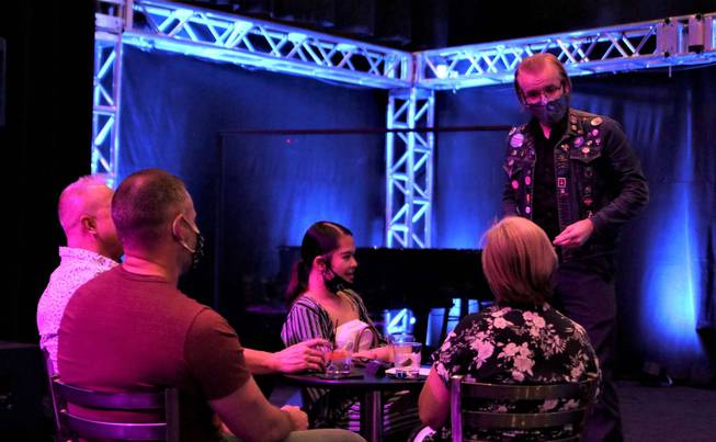 Magician Eric Stevens performs during "Late Night Magic" at Notoriety on July 3.