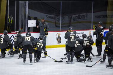 Vegas Golden Knight head coach Peter DeBoer talks with his team during practice at City National Arena, Monday, July 13, 2020.