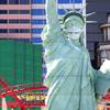 The Statue of Liberty wears a face mask in front of the New York-NewYork on the Las Vegas Strip Friday, July 17, 2020. The oversized mask measures over nine feet wide, five feet, six inches tall and reads "Vegas Safely." The half-size replica of the Statue of Liberty is 150 feet tall from the ground to the top of the torch, including the pedestal.