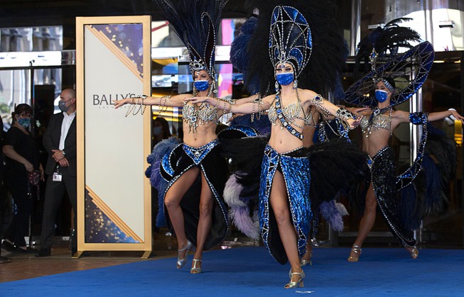 Showgirls perform during a reopening ceremony for Bally's at the ...