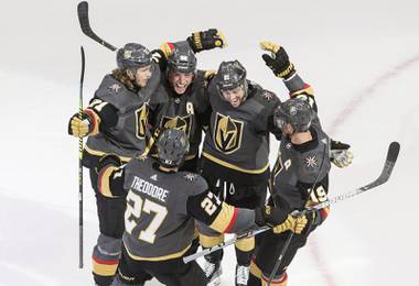 Vegas Golden Knights celebrate a goal during the third period of an NHL hockey playoff game against the Dallas Stars Monday, Aug. 3, 2020 in Edmonton, Alberta. (Jason Franson/The Canadian Press via AP)