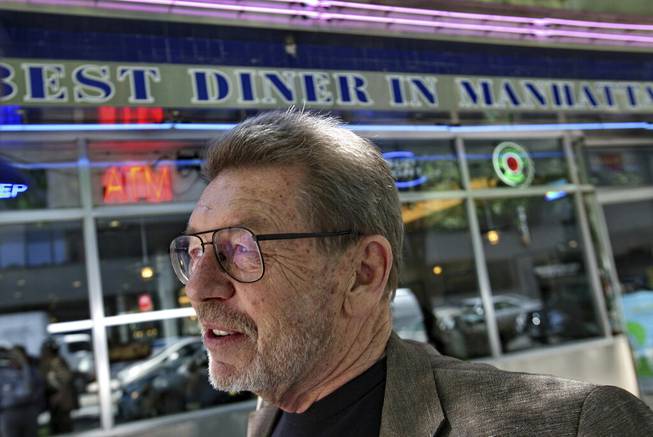In this June 5, 2007 file photo, Pete Hamill responds during an interview at the Skylight Diner in New York. The longtime New York City newspaper columnist and author has died. His brother Denis Hamill said Pete died Wednesday, Aug. 5, 2020 in Brooklyn.