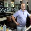 Gino Ferraro is shown at Ferraro's Italian Restaurant & Wine Bar Tuesday, Aug. 11, 2020. He is among many restaurant owners suffering amid the pandemic.