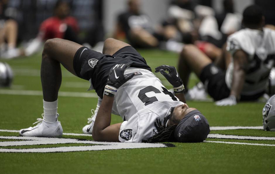 Las Vegas Raiders defensive tackle Maliek Collins (97) stretches