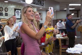 Carrie Prejean Boller 2009 Miss California, reacts as she watches a broadcast of President Trump at the Omelet House in Summerlin Thursday, Aug. 27, 2020. Trump officially accepted the nomination for president during the Republican National Convention.