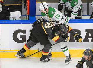 Vegas Golden Knights' Paul Stastny (26) checks Dallas Stars' Corey Perry (10) during the first period of Game 1 of an NHL Western Conference final hockey game, Sunday, Sept. 6, 2020 in Edmonton, Alberta.