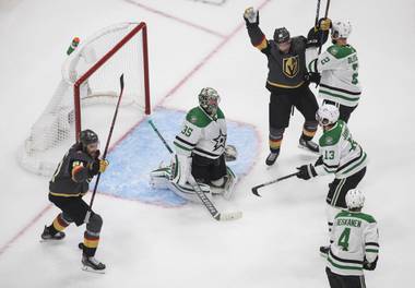 Vegas Golden Knights’ Mark Stone (61) and Paul Stastny (26) celebrate a goal against Dallas Stars goalie Anton Khudobin (35) during the second period of Game 2 of the NHL hockey Western Conference final, Tuesday, Sept. 8, 2020, in Edmonton, Alberta. 