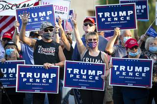 Trump supporters protest at the Sawyer State Building in Las Vegas Thursday, Sept. 10, 2020. Protesters were unhappy that President Trump's rallies scheduled for this weekend in Nevada were cancelled due to COVID-19 restrictions.