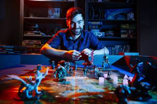 Dungeons and Dragons player Levi Harbeson, shown Thursday, Sept. 3, 2020, says role-playing games have kept those in his social circle occupied during the pandemic.