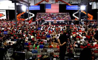 Supporters of President Donald Trump pack a warehouse during an indoor rally at Xtreme Manufacturing in Henderson Sunday, Sept. 13, 2020. 