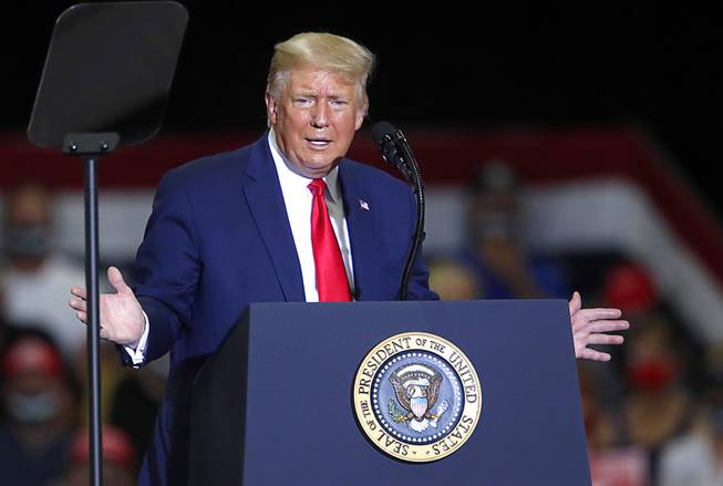 President Donald Trump speaks at a rally at Xtreme Manufacturing in Henderson Sunday, Sept. 13, 2020. 