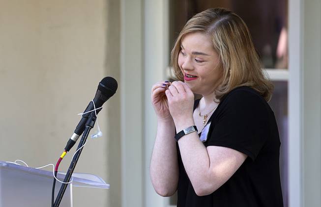 Michelle Desrochers gives a performance using American Sign Language during the official opening of the Collaboration Center at LV Ranch Thursday, Sept. 24, 2020. The new campus will provide support services, therapy, group classes and recreation to individuals with disabilities.