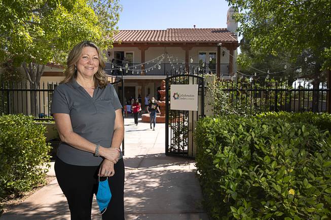 Lynda Tache, president and CEO of the Collaboration Center Foundation, poses outside the main house during the official opening of the Collaboration Center at LV Ranch Thursday, Sept. 24, 2020. The new campus will provide support services, therapy, group classes and recreation to individuals with disabilities.