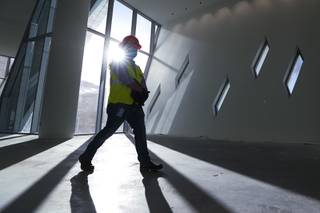An employee walks through a meeting space during a tour of the Las Vegas Convention Center West Hall expansion, Monday, Oct. 12, 2020.