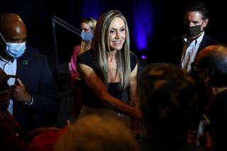 Lara Trump, wife of Eric Trump, greets supporters of President Donald Trump during a campaign event at The Westin Las Vegas Tuesday, Oct. 20, 2020.