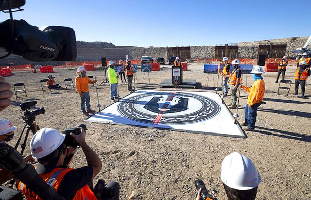 Henderson Mayor Debra March speaks during the celebration of a construction milestone at the Henderson Events Center construction site Wednesday, Oct. 28, 2020. The multi-purpose, 6,000-seat indoor events center will be the arena for the Henderson Silver Knights. The Silver Knights logo is positioned at where center ice will be.