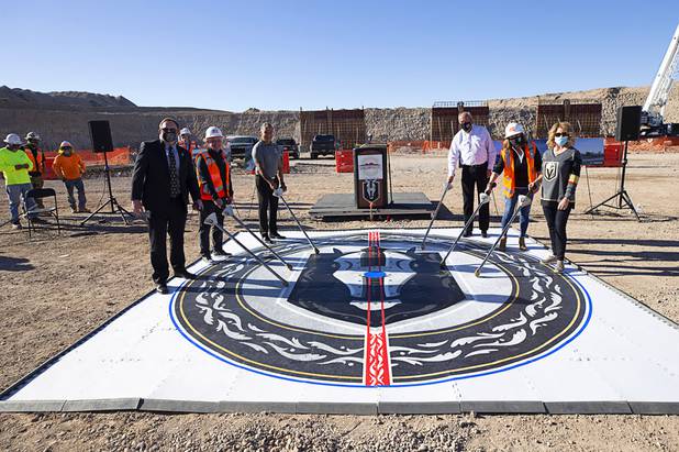 Officials pose with ceremonial lances during the celebration of a construction milestone at the Henderson Events Center construction site Wednesday, Oct. 28, 2020. From left: Henderson City Manager Richard Derrick, Vegas Golden Knights President Kerry Bubolz, Silver Knights Head Coach Manny Viveiros, Henderson City Councilman John Marz, Henderson Mayor Debra March and Henderson City Councilwoman Michelle Romero.